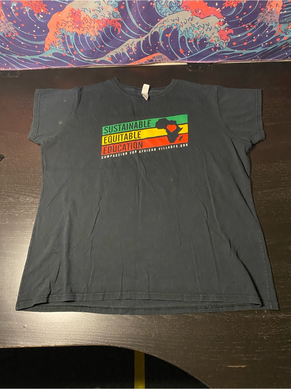 Gildan Black Tee with Green-Yellow-Orange Equity Graphic
